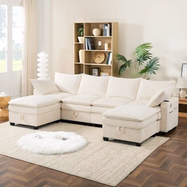Divano modulare a forma di U beige in velluto a coste con ricarica USB, portabicchieri e pouf coordinato