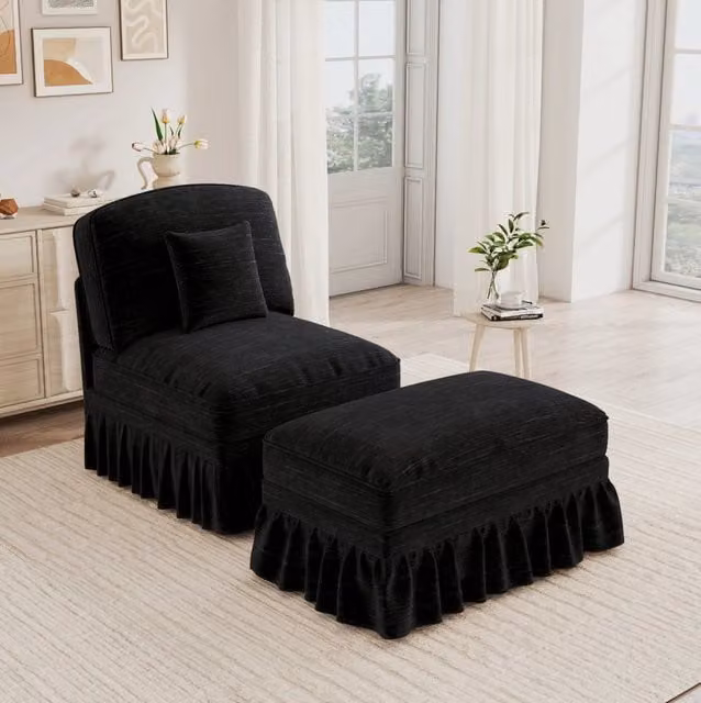 Divano lounge in ciniglia nero con pouf mobile; cuscino e gonna rimovibile