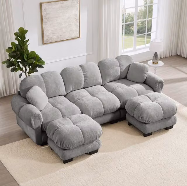 Divano modulare MODFU grigio con pouf e cuscini, configurazione reversibile a U o L, L: 260 cm, P: 149 cm, H: 90 cm