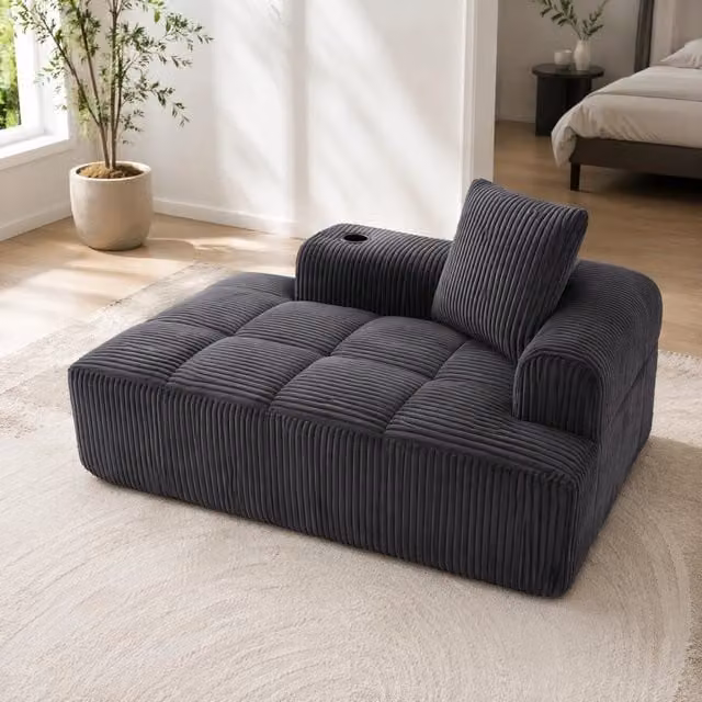 Divano compatto ULEVR 158x93x61 cm in velluto a coste grigio scuro, con tasche laterali e portabicchieri