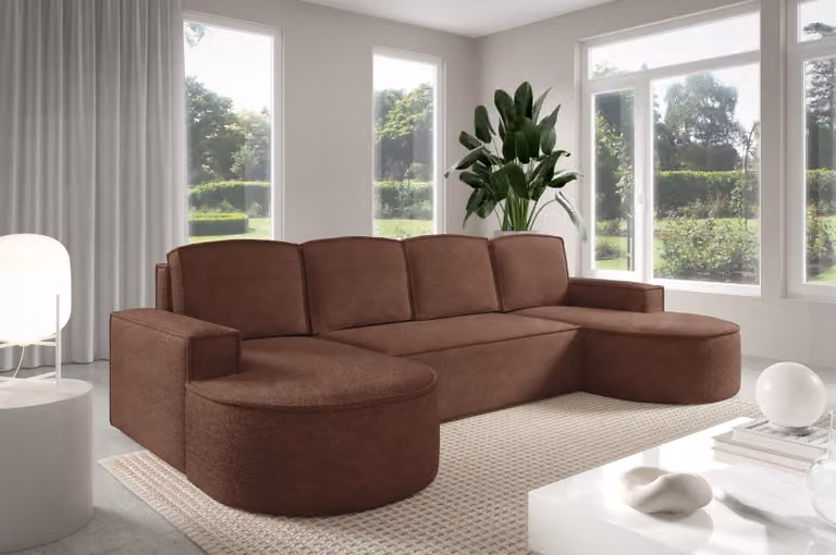 Divano angolare GUTTO Molly a forma di L, con linee arrotondate e rivestito in tessuto boucle color "Rusty green". Un modello di tendenza per il 2025 (con possibilità di trasformazione in letto)