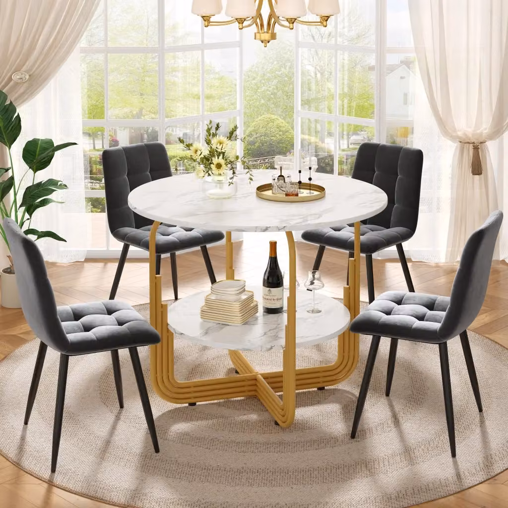 Set da pranzo FOLYNA composto da tavolo rotondo in MDF effetto marmo e 4 sedie in velluto grigio con dettagli oro e bianco