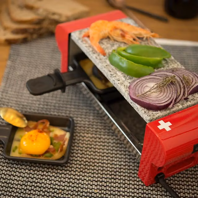 Raclette H.Koenig RP2 rossa con piastra in pietra naturale e rivestimento antiaderente per 2 persone – 1