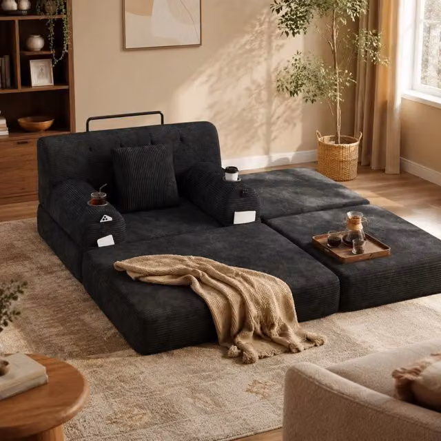 Poltrona letto singola FOLYNA in velluto a coste nera con schienale alto, tasche laterali e portabevande, L: 107 cm, P: 162 cm, H: 81 cm