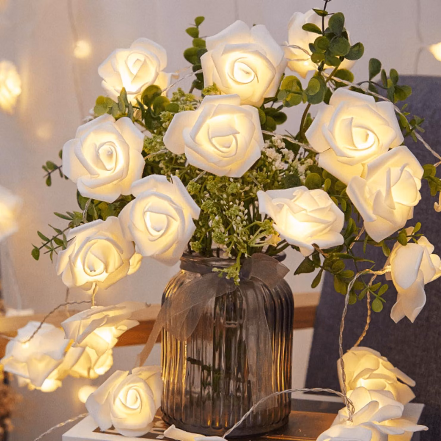 Catena luminosa con 20 rose LED, luce bianco caldo, lunghezza 3 metri, alimentazione a batteria