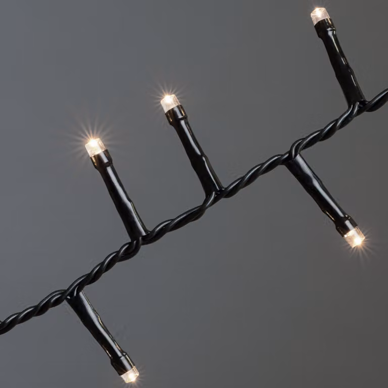 Konstsmide Micro LED Compactlights, 2000 diodi bianco caldo, 30V, per esterni (IP44), cavo nero - 3872-100