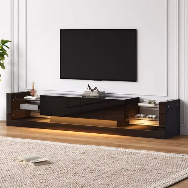 Mobile porta TV moderno Vovees Living nero lucido con illuminazione LED integrata, L: 181 cm, P: 38 cm, H: 38 cm