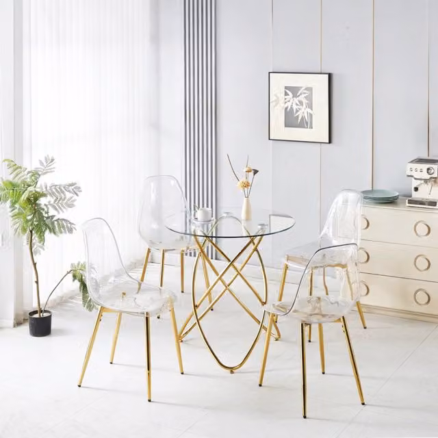 Set da pranzo moderno Zephmum composto da 1 tavolo rotondo e 4 sedie in metallo e vetro color oro e trasparente