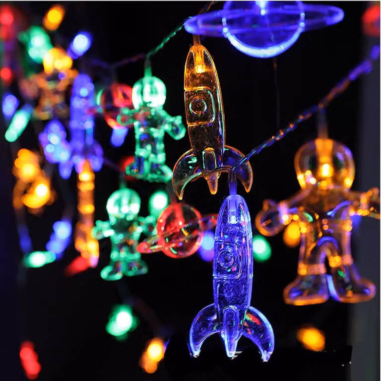 Catena luminosa con 20 LED, a tema astronauta e razzo, lunghezza 3 metri, multicolore