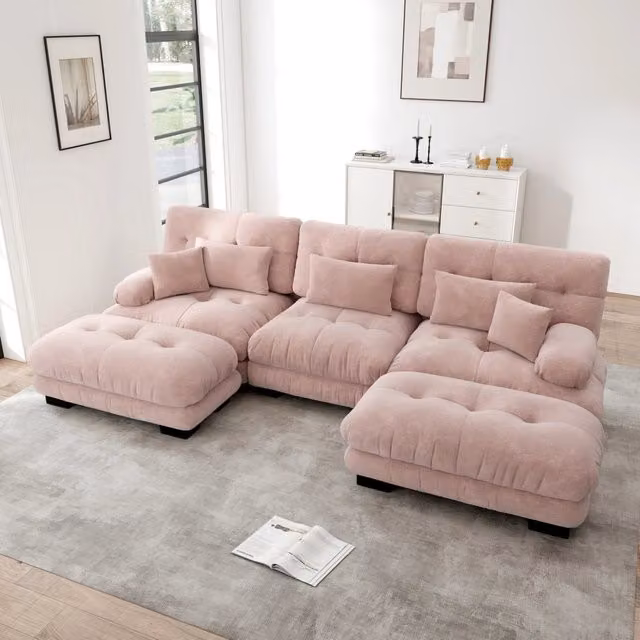 Divano angolare modulare a U OKWISH in ciniglia rosa con pouf e cuscini coordinati per il tuo soggiorno