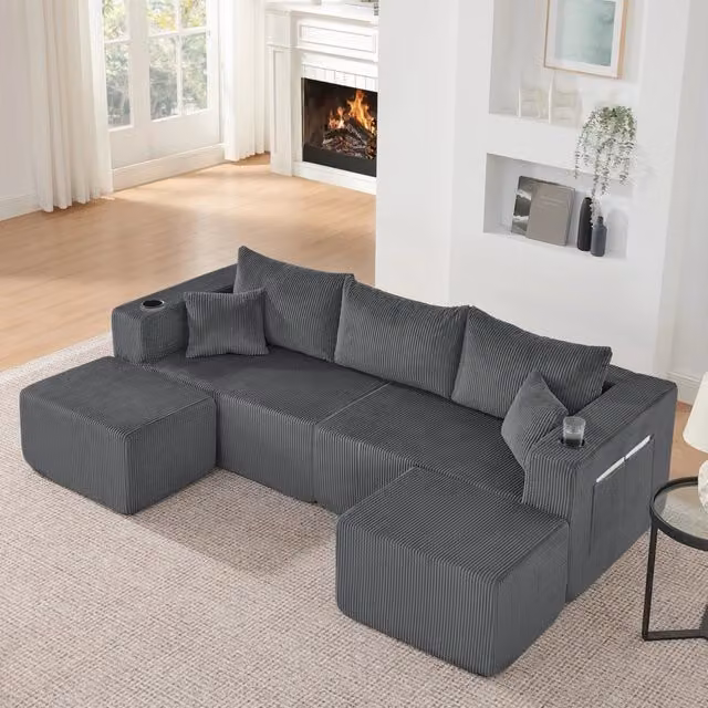Divano angolare modulare Mivray a 3 posti in tessuto a coste grigio con pouf, portabevande e cuscini inclusi
