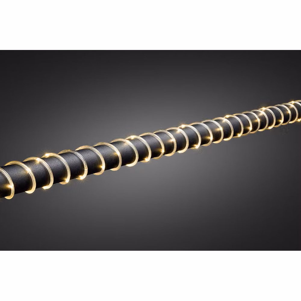 Konstsmide 3773-100 Mini lampada a corda a LED, 5 m, con sensore di luminosità e timer 6h e 9h, 65 diodi bianco caldo, a batteria, per esterni (IP44), cavo trasparente, 2 x D 1,5V (escl.)