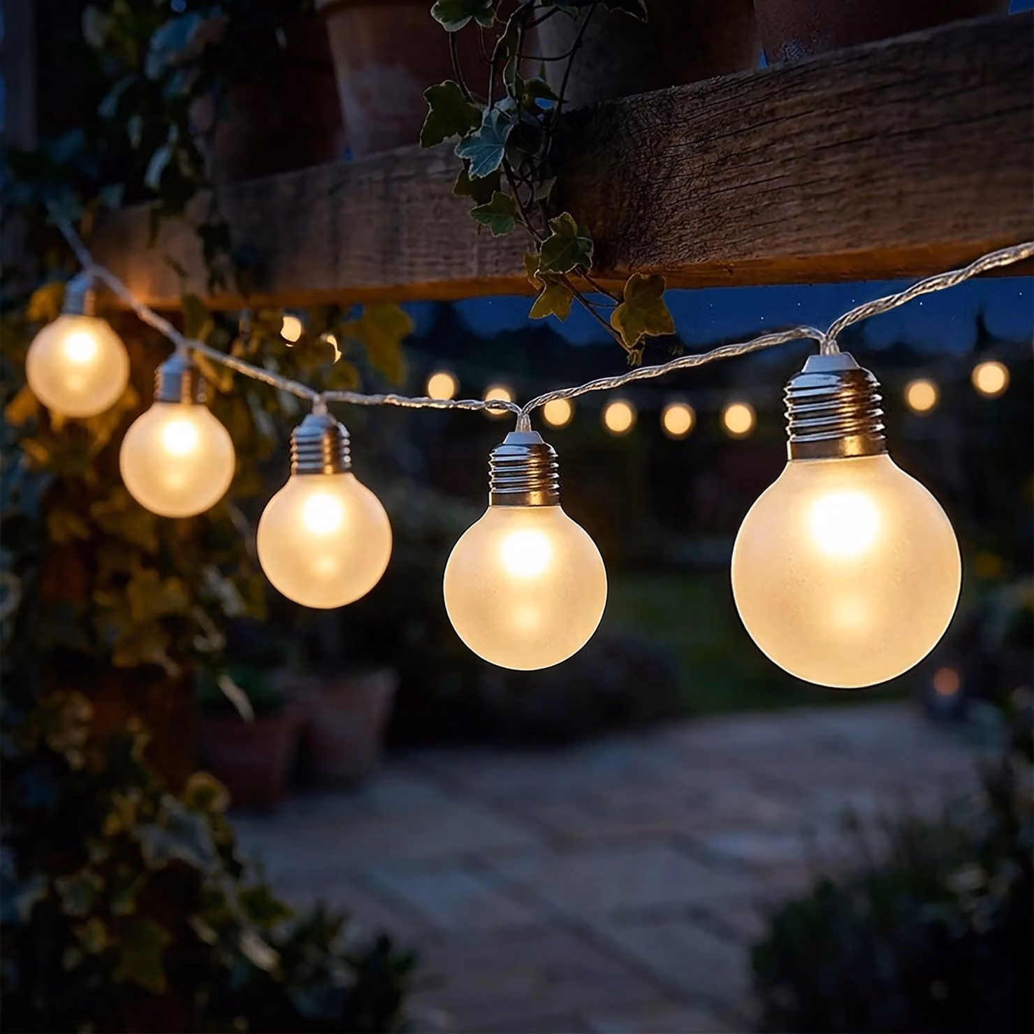 Catena luminosa con 8 lampadine LED, trasparenti, luce bianco caldo, lunghezza 110 cm, alimentazione a batteria