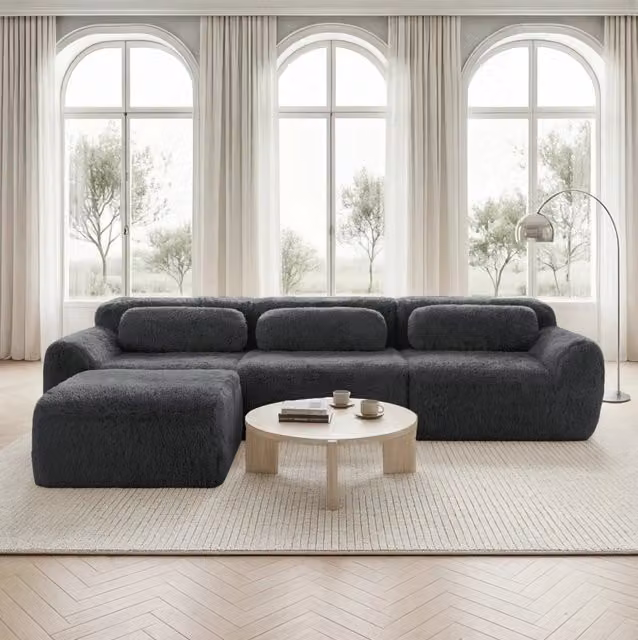Divano angolare modulare a L in peluche grigio 291x179 cm HOMVRA