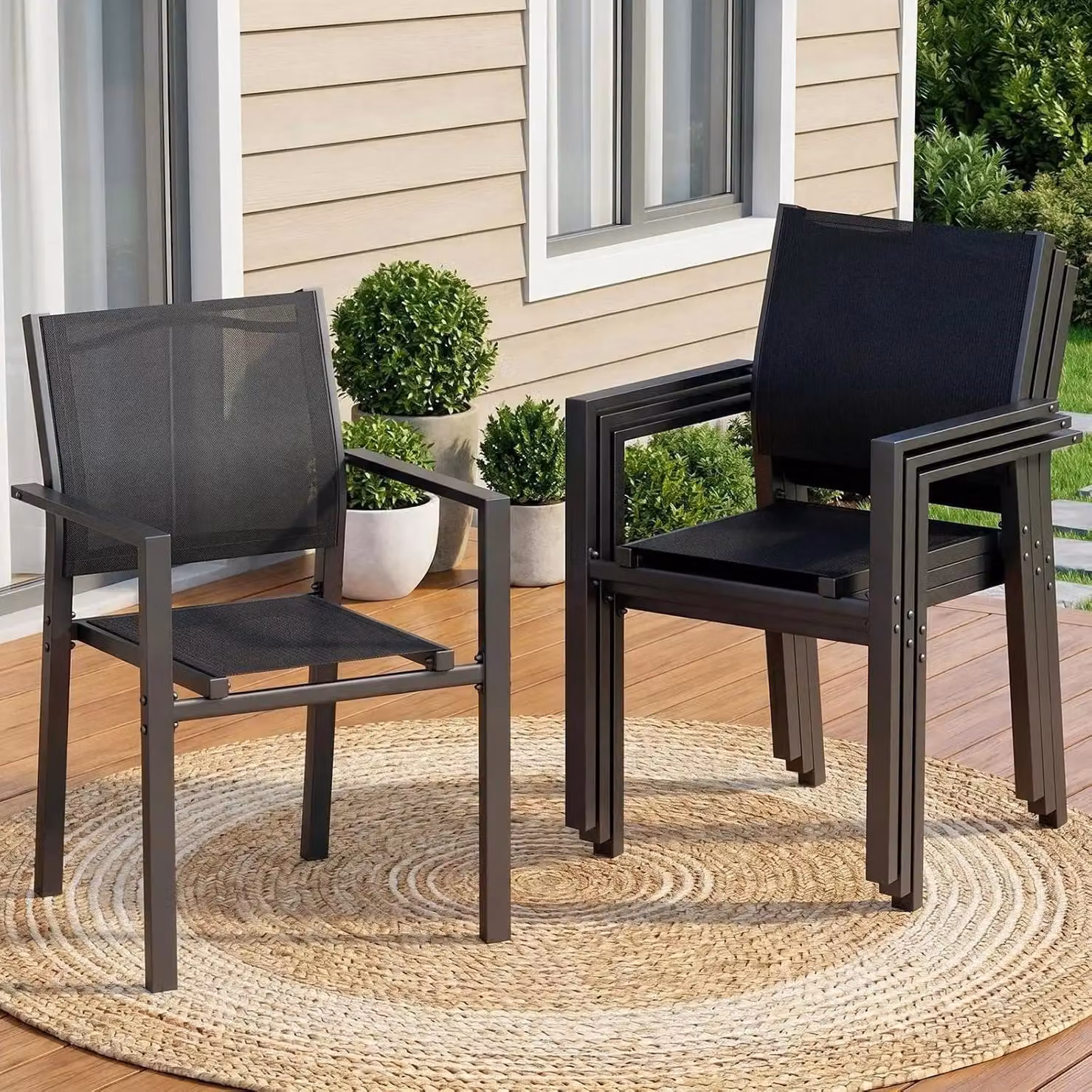 Sedie da giardino impilabili - Set di 4 sedie da esterno - Rivestimento in textilene e struttura in metallo - Con braccioli - Resistenti agli agenti atmosferici, fino a 120 kg - Colore: nero