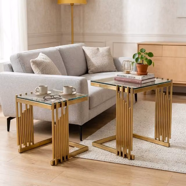 Set di 2 tavolini quadrati combinabili in acciaio inox e vetro temperato oro e trasparente