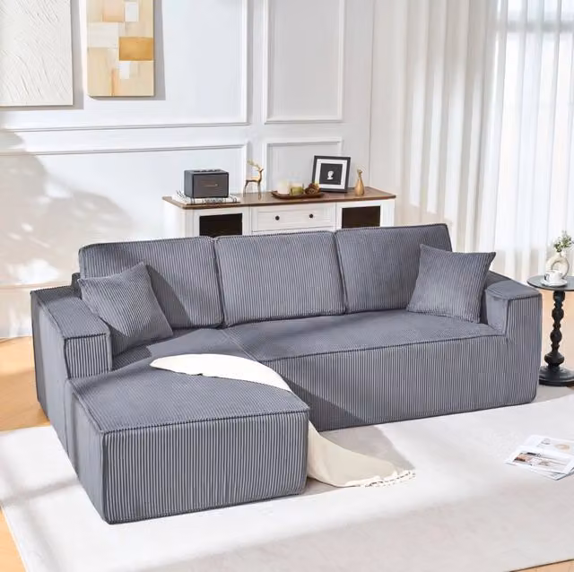 Divano angolare modulare a L 235x128x60 cm in velluto a coste grigio con chaise longue e 2 cuscini