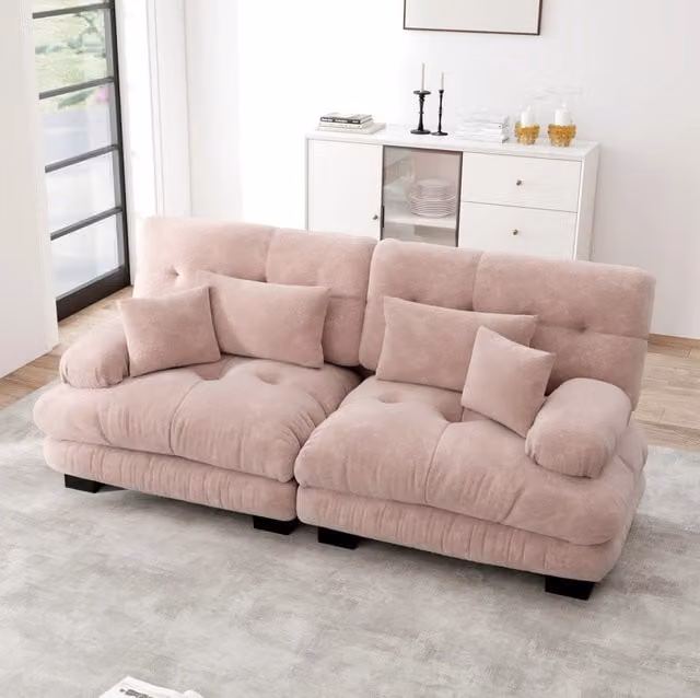 Divano modulare in ciniglia rosa con cuscini lombari e decorativi