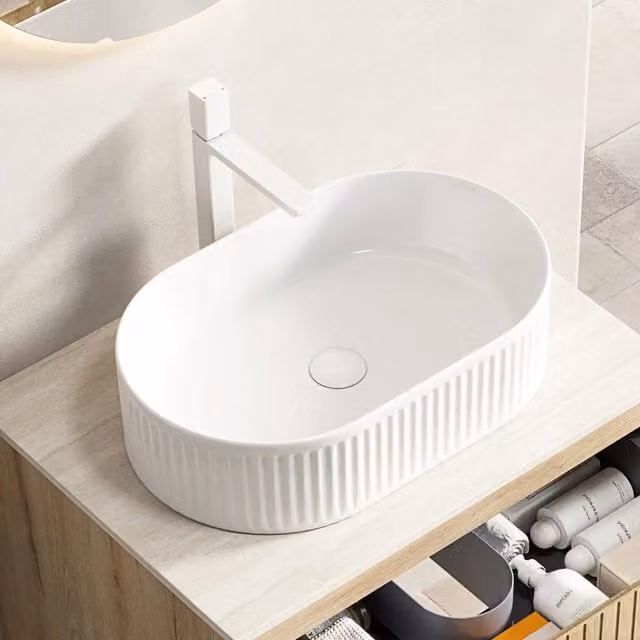 Lavabo da appoggio ovale in ceramica bianca con foro per rubinetto resistente alle macchie e ai graffi per bagno