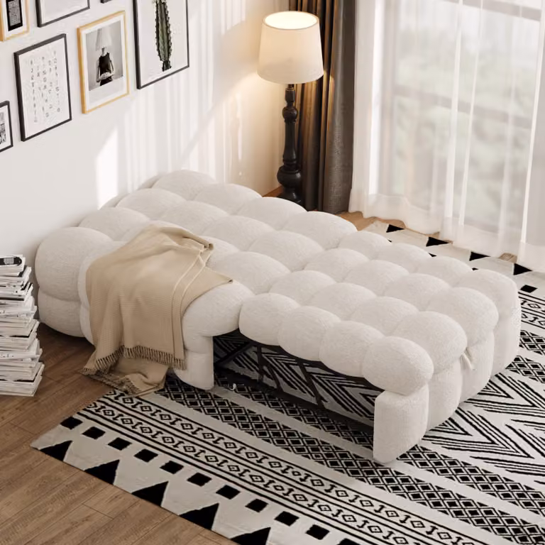 Letto imbottito STILVORA con poggiapiedi 2-in-1, divano letto con meccanismo estraibile, letto singolo rivestito in tessuto bouclé, color beige