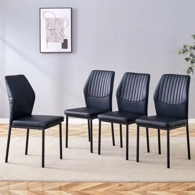 Set di 4 sedie da pranzo nere in PU con gambe in metallo