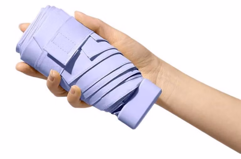 Ombrello pieghevole da donna, protezione UV, colore viola chiaro, con manico in metallo