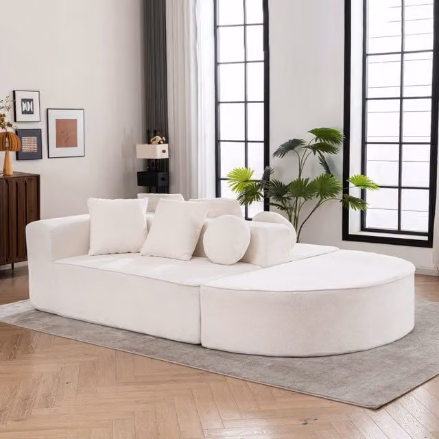 Divano modulare a L WISHDOR in tessuto bianco con funzione letto e cuscini inclusi, L/P/H: 263 x 171 x 66 cm