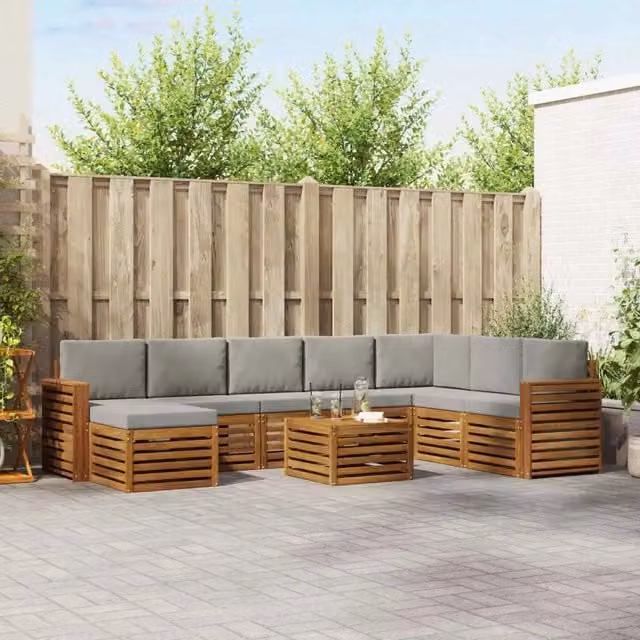 Set di divani da esterno a L vidaXL in legno di acacia con cuscini grigi, composto da 9 pezzi con tavolino e pouf