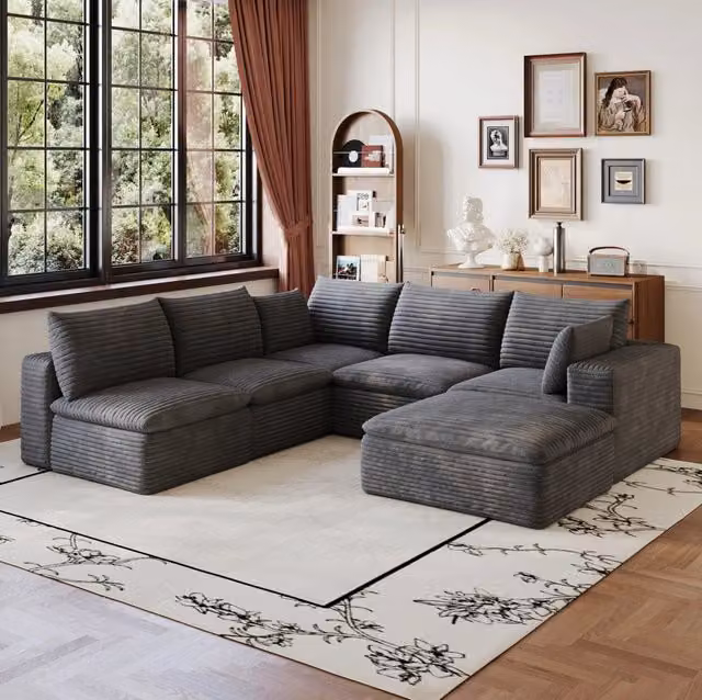 Divano modulare in tessuto grigio scuro con imbottitura in schiuma e design componibile