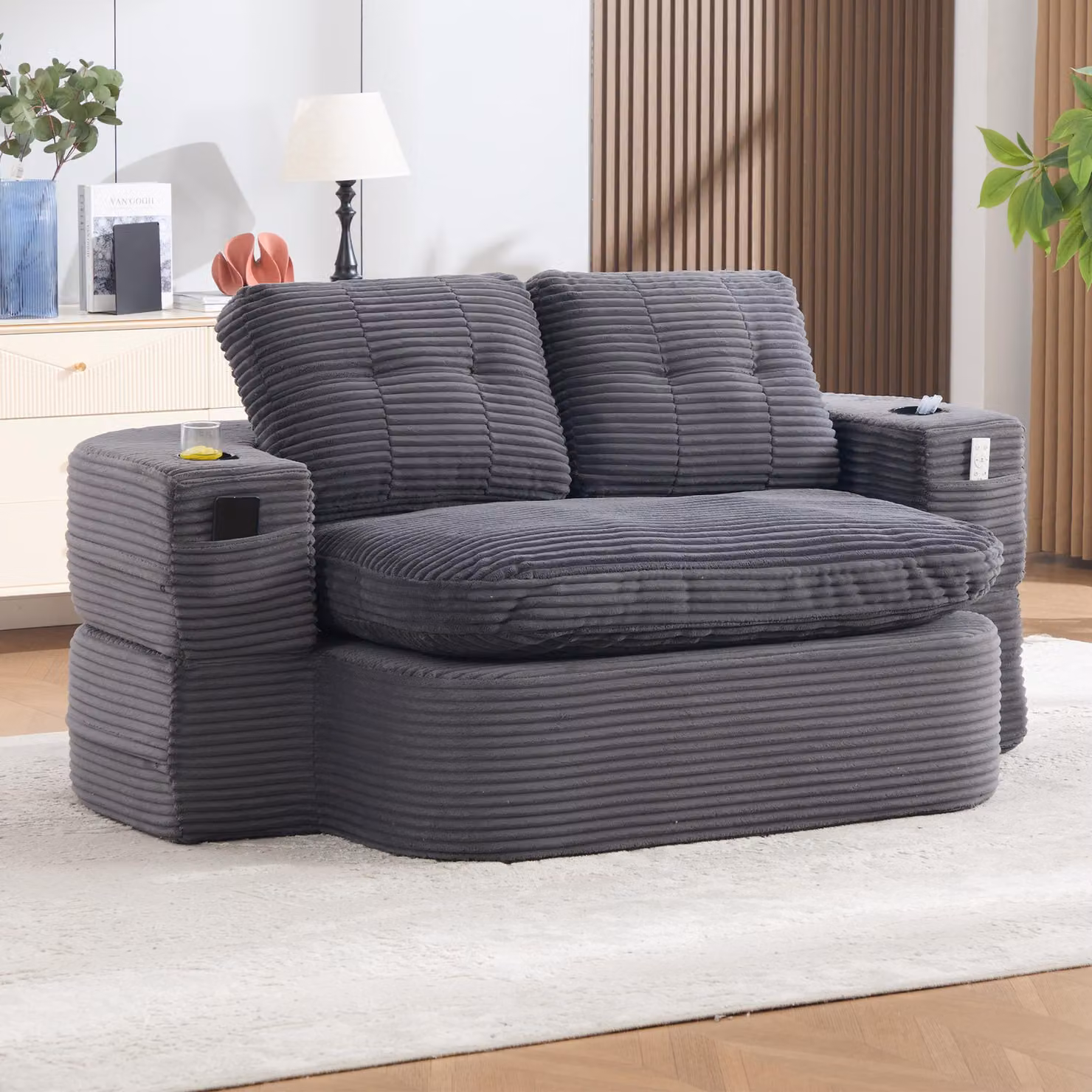 DIVANO MODULARE RELAXSOFA MODFU, rivestito in tessuto cordato, trasformabile in un divano lounge 2-in-1 con funzione relax, dotato di due portabicchieri e seduta particolarmente profonda, colore grigio scuro