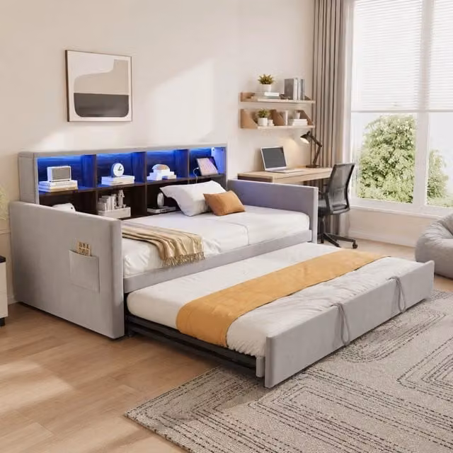 Divano letto imbottito 90x190 cm con letto estraibile; vani contenitore; LED e prese; velluto grigio chiaro