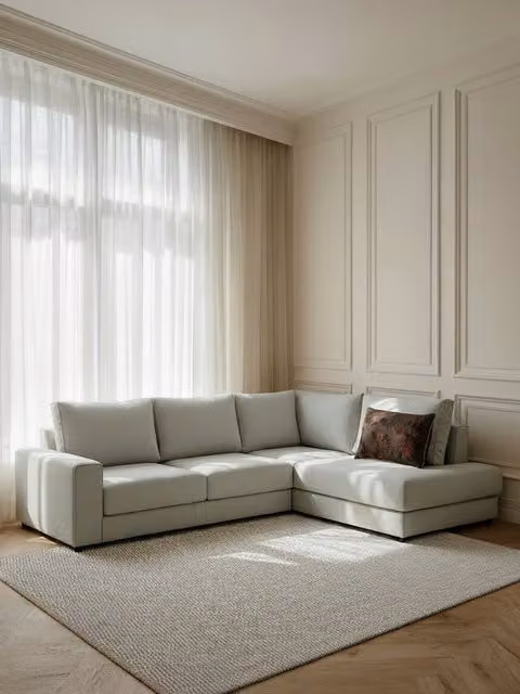 Divano angolare Orson Kenay Home colore perla con seduta destra e cuscini inclusi