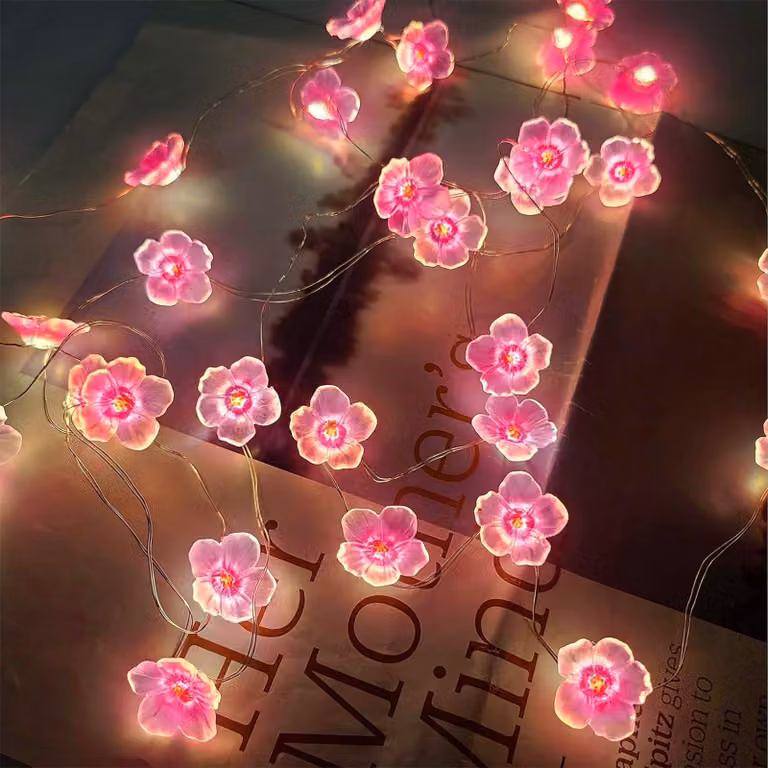 Catena luminosa a forma di fiori di ciliegio, 2 metri, 20 LED, alimentazione a batteria, per interni/esterni