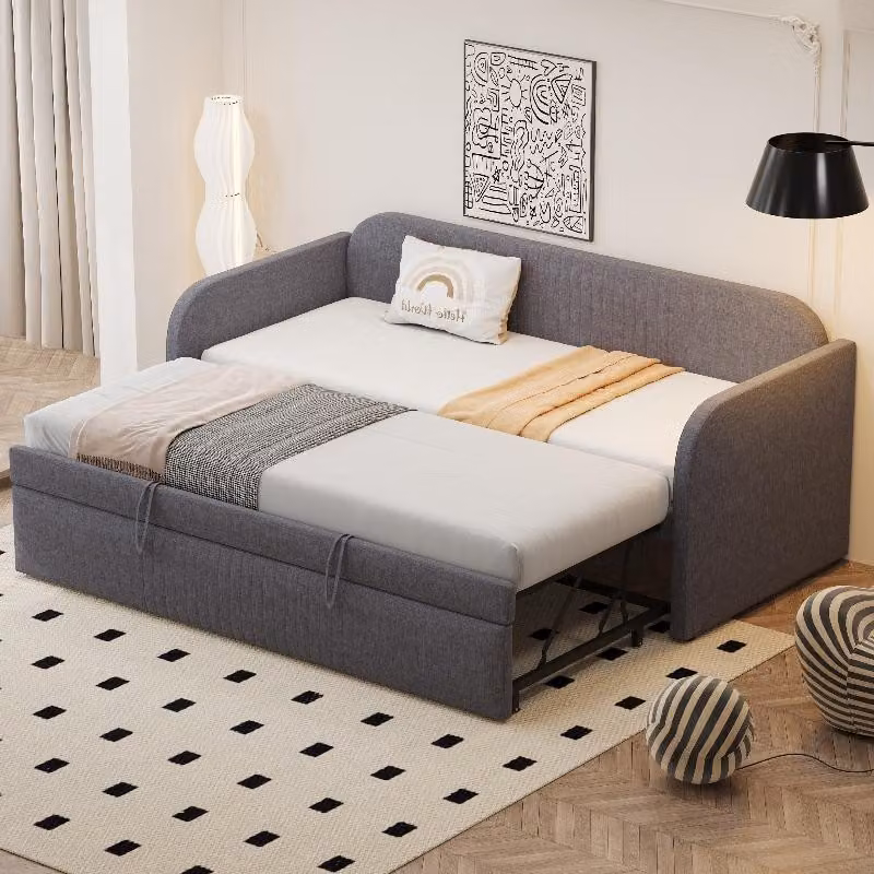 Divano letto 90x190 cm, estendibile a 180x190 cm, con struttura imbottita e rete a doghe, rivestito in tessuto di lino grigio con motivo a righe verticali, ideale per soggiorni o camere degli ospiti