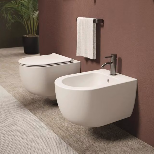 Coppia Di Sanitari Alice Ceramica Sospesi Senza Brida Bianco Opaco "Unica 55"
