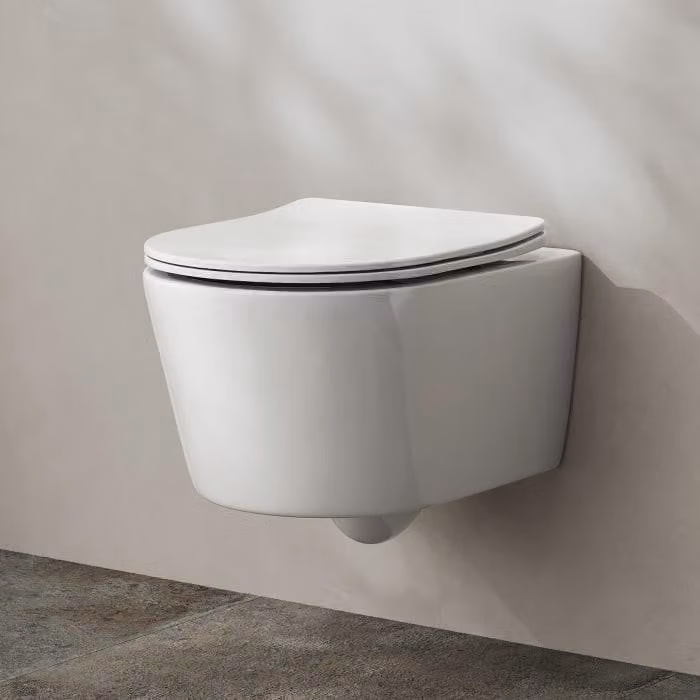 Set completo per vaso sospeso a muro Kronenbach, modello compatto, senza anello di risciacquo, con sistema di scarico a rotazione e sedile WC slim