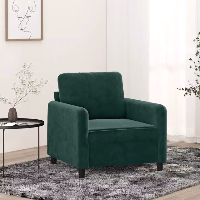 Poltrona moderna in velluto verde con struttura in metallo e braccioli