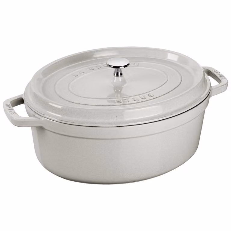 Casseruola ovale in ghisa per induzione colore bianco tartufo con maniglie e coperchio, diam. 27cm