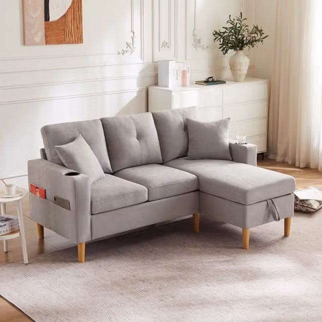 Divano angolare REDOM grigio con chaise longue reversibile, contenitore e portabicchieri, L/P/H: 175 x 129 x 90 cm