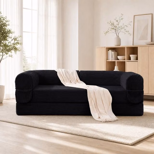 Divano letto Mivray a 2 posti convertibile in letto matrimoniale rivestito in velluto a coste nero con braccioli imbottiti