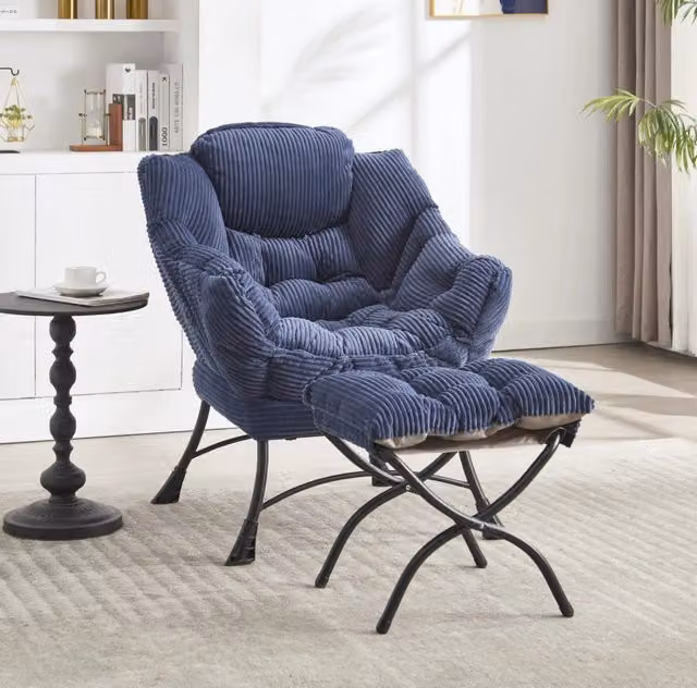 Poltrona relax con pouf imbottita in velluto blu navy con struttura in acciaio e tasca laterale
