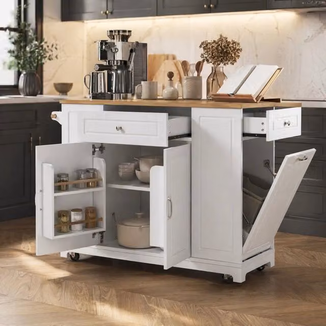 isola cucina mobile bianca con piano ribaltabile, prese integrate e vani contenitori