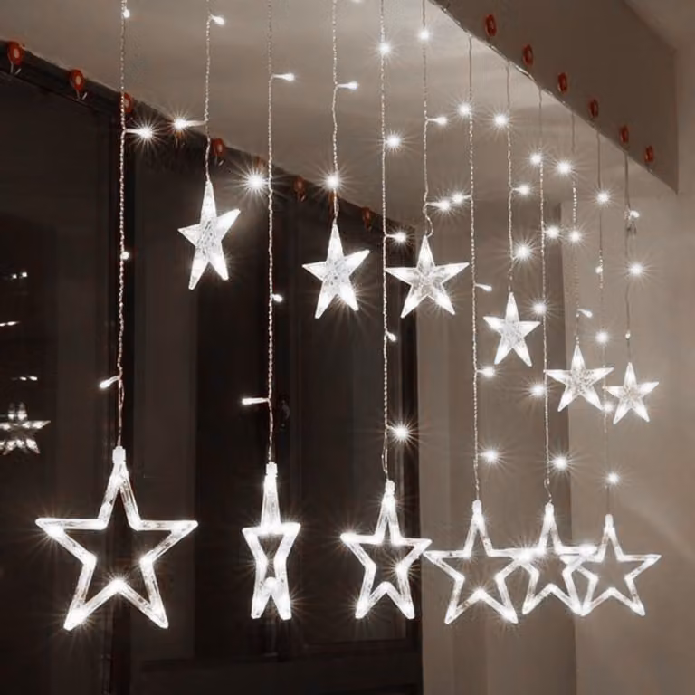Stelle di Natale appese a una tenda di ghiaccioli 4m 138 LED