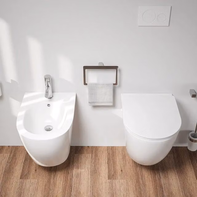 Coppia di sanitari sospesi in ceramica bianco lucido vaso rimless con copriwc soft-close e bidet | Europa Small