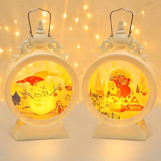 Set Azomor composto da 2 suggestive lanterne natalizie con luce LED bianca calda per interni