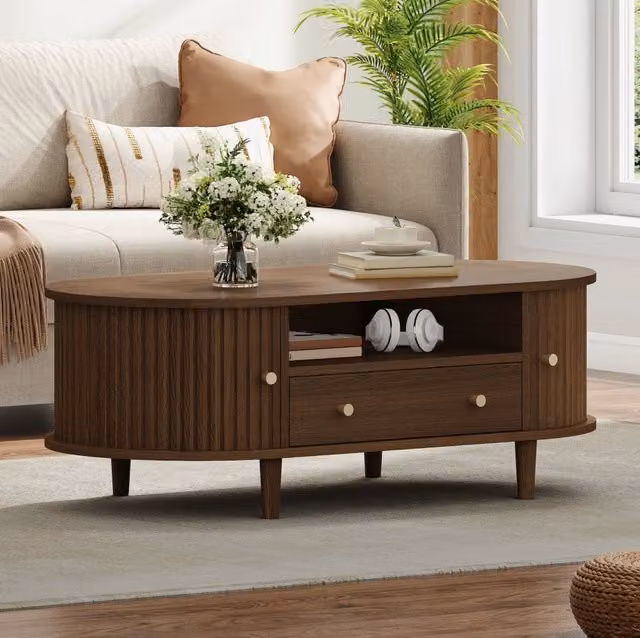 Tavolino da caffè ovale 100x50x36 cm in MDF con finitura noce, 1 cassetto, anta a serranda e 4 gambe di supporto