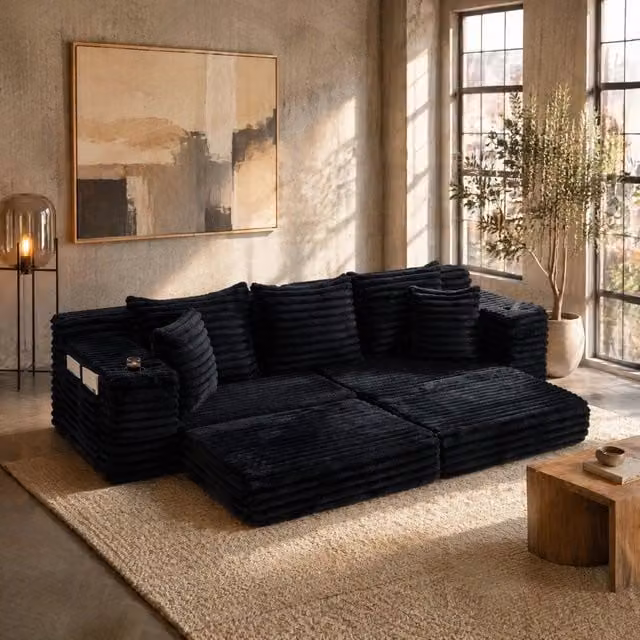 Divano letto REDOM in velluto a coste nero con funzione letto, portabicchieri e cuscini inclusi, L: 273 cm, P: 98 cm, H: 87 cm