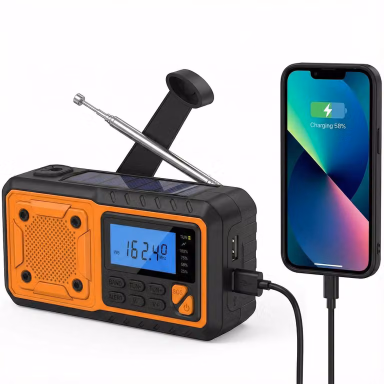 AIORBER Radio di emergenza portatile con torcia LED, allarme SOS, manovella, ricarica solare, porta USB, ricezione FM/AM/WB, dimensioni compatte - Arancione