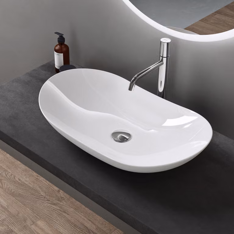 doporro Lavabo da Appoggio Ovale in Vetroceramica Bianco Lucido 63x36,5x14 cm, Lavandino Bagno Moderno Effetto Loto, Senza Foro Rubinetto - Brš¹ssel858