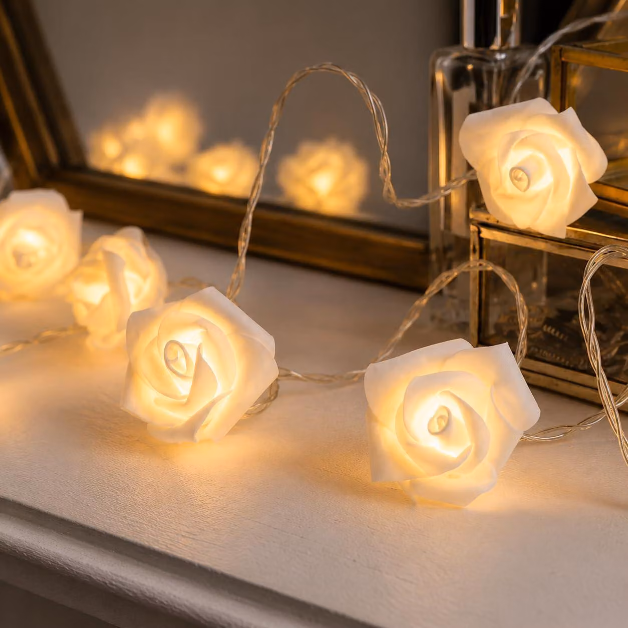 Catena luminosa a forma di rosa, 20 LED, luce bianco caldo, 3,8 metri, alimentazione a batteria, con timer